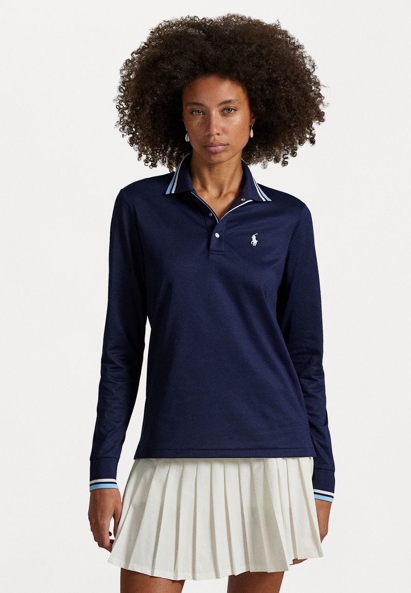 Navy long-sleeve polo shirt with a buttoned collar, featuring light blue and white striped accents and a small embroidered logo on the chest.