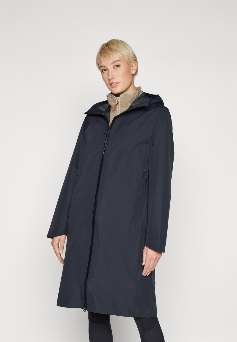 Waterproof, dark navy coat with a zip closure, hood, and straight cut. Features side pockets and a smooth, matte texture.