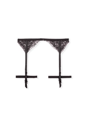 Cinturilla de encaje negro con correas ajustables, bordes en forma de concha y acentos de lazo. Presenta un delicado patrón floral en toda su superficie.