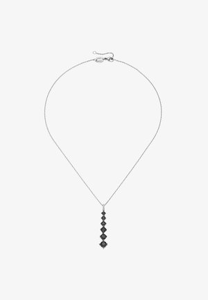 Silver chain necklace featuring a vertical row of round black stones, with seven stones of varying sizes, set in circular metal clasps.