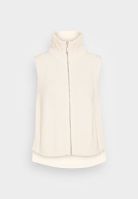 Bezrukávý pletený svetr v krémové barvě s vysokým límcem, vybavený předním zipem a žebrovanou strukturou, navržený s bočními rozparky na dolním lemu.