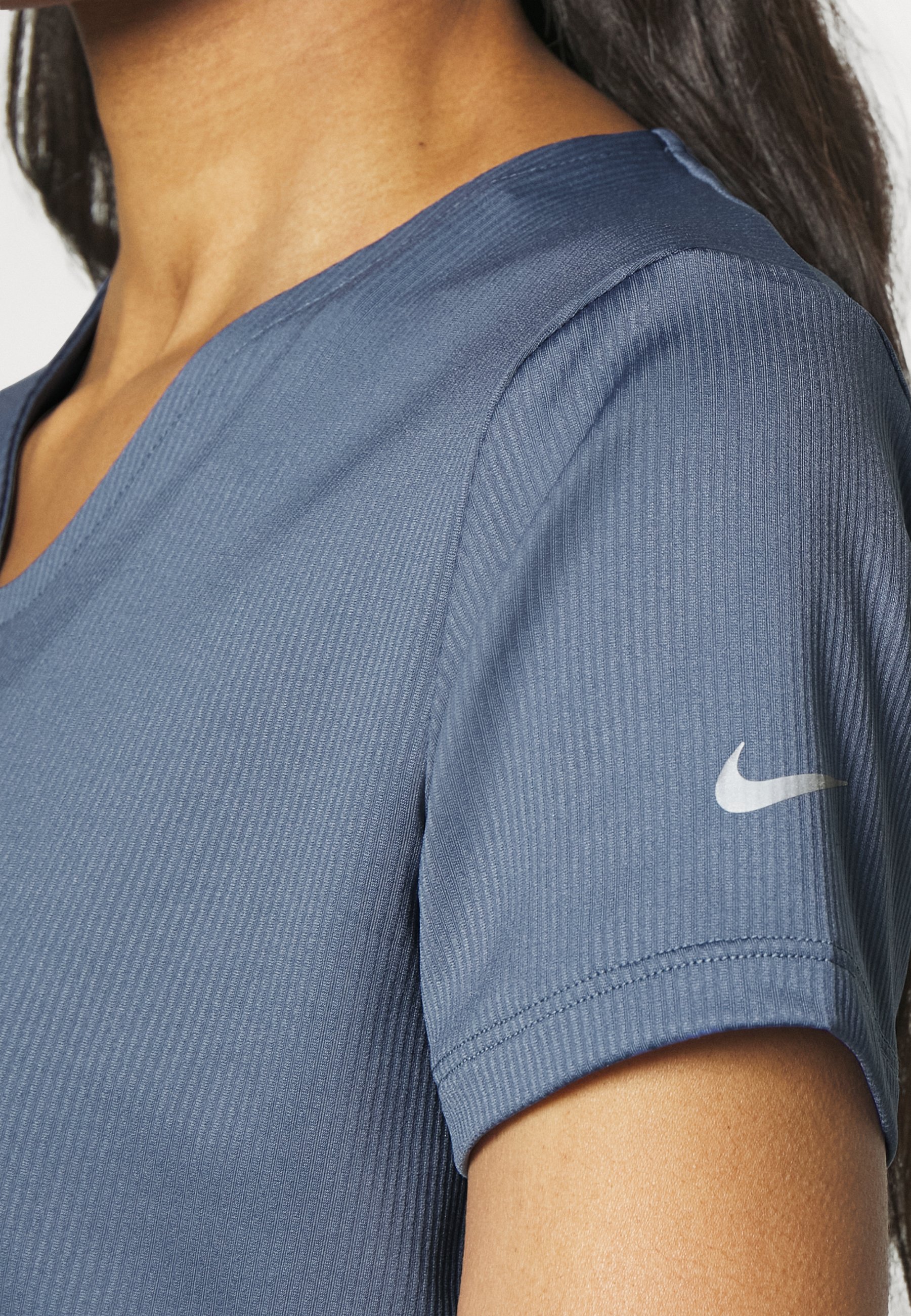 diffused blue nike shirt