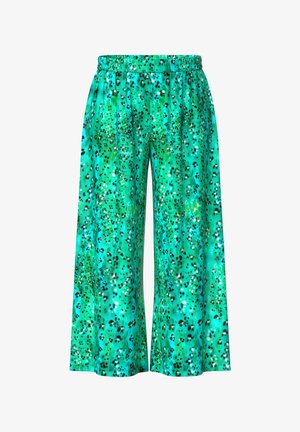Volné, široké kalhoty v tyrkysové barvě s pružným pasem, zdobené zeleno-černým skvrnitým leopardím vzorem.