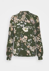 Blommig långärmad blus i mörkgrönt, med en volangkrage och en blandning av rosa, vita och blå blommor över hela. Mjuk tyg.