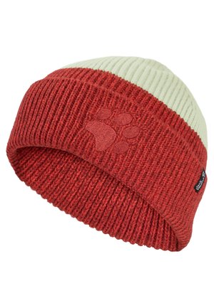 Bonnet en tricot avec un large revers rouge comportant une empreinte de patte brodée et une partie supérieure de couleur crème.