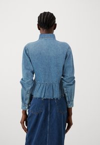 ONLY ONLELLI FRILL - Button-down blouse - medium blue denim