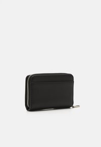 Calvin Klein Jeans SCULPTED ZIP AROUND DEBOSS - Lommebok - black