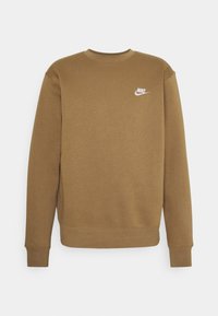 Brun långärmad Nike sweatshirt med rund hals och liten vit Nike-logotyp på övre vänstra bröstet.