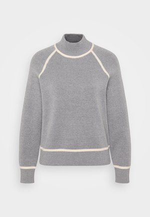 Grauer Pullover mit hohem Kragen, gerippter Struktur und cremefarbener Akzentierung entlang des Kragens und Saums. Verfügt über einen Raglan-Ärmel-Design.