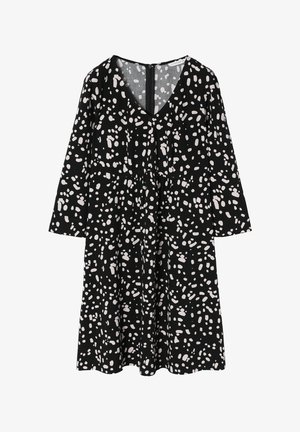 Sort kjole med lange ærmer, V-hals og rynket talje. Har et spredt hvidt prikmønster over det hele. Blød stoftekstur.