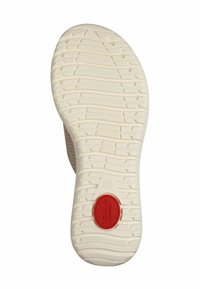 Sula i off-white gummi med texturerat mönster och en röd detalj med varumärkesinformation. Storlek 37 angiven på designen.
