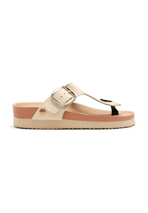 Sandale en plastique couleur crème avec une épaisse semelle compensée, une semelle intérieure texturée, une boucle proéminente et une sangle noire en accent. Matériau doux et durable.