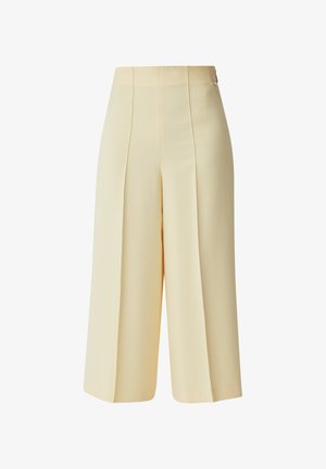 Beige maßgeschneiderte Culottes mit Falten, hohem Bund und glattem Stoff; knielange Länge und saubere Kanten ohne Taschen oder Verzierungen.