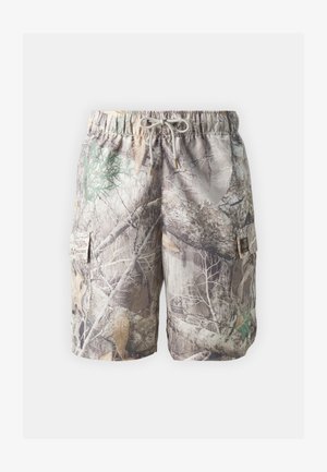 Pantaloni cargo mimetici realizzati in un materiale leggero, con vita regolabile a cordino, tasche laterali e una combinazione di tonalità e motivi terra.