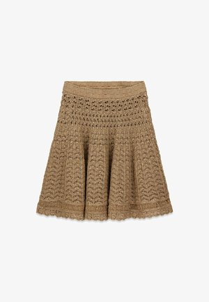 Falda de punto beige en línea A con patrón calado intrincado, cintura elástica y dobladillo con borde ondulado.