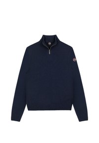 Mørkeblå langærmet sweater med ribstrikkede manchetter, halvlukker ved kraven og et rundt logoemblem på det øverste venstre ærme.