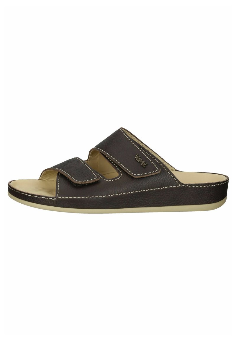Brune lædersandal med to justerbare Velcro-stropper, gummisål og kontrasterende hvid syning langs kanterne.