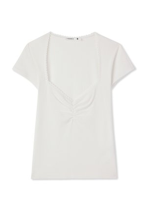 Top bianco a maniche corte con motivo a coste, scollo quadrato, bordo smerlato e dettaglio arricciato al centro davanti.