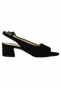 Sandali con tacco in suede nero, slingback, con punta aperta, tacco a blocco e dettaglio metallico sulla suola. Presentano un fiocco sulla cinghia.