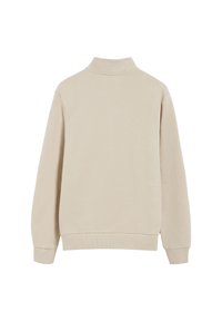 Felpa beige con colletto alto, maniche lunghe e polsini a coste. Realizzata in un morbido tessuto testurizzato con una vestibilità rilassata.