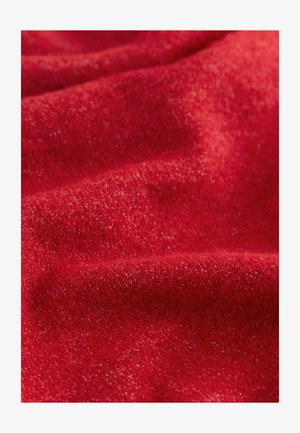 Red textured fabric with a soft, slightly fuzzy surface displaying a subtle, uneven weave pattern. Material appears warm and cozy.