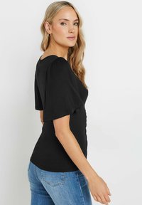 Long Tall Sally - T-shirt z nadrukiem