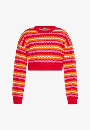 Lühendatud sviiter, millel on erksates roosa, punase, oranži ja kollase värvitoonides laineline muster. Valmistatud tekstuuriga kudumimaterjalist, mille mansetid on soonilised.