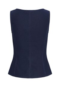 Veste sans manches en denim bleu marine avec une taille ajustée et des coutures verticales visibles dans le dos.