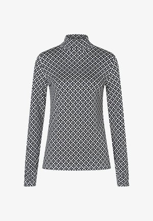 Langärmliges Rollkragenoberteil in einem schwarz-weißen geometrischen Muster, mit einer figurbetonten Passform und glatter Stofftextur.
