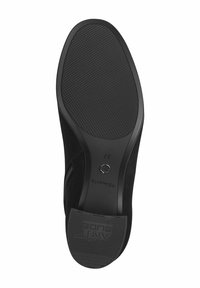 Semelle de chaussure noire avec grip texturé, talon antidérapant, fermeture éclair latérale, taille 37, et nom de la marque « Tamaris » visible sur la semelle.