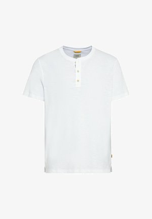 Witte T-shirt met korte mouwen van zacht materiaal, met een ronde hals, een drieknoopsluiting en zijsplitten aan de zoom.