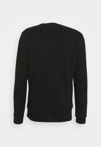 Felpa nera con maniche lunghe e colletto a girocollo. Presenta un tessuto testurizzato e polsini e orlo a costine. La vista posteriore mostra un colore uniforme.