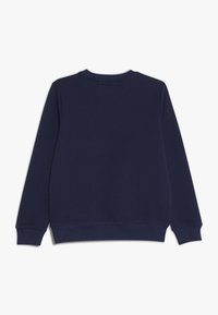 Laivastonsininen collegepaita, jossa pitkät hihat, pyöreä pääntie, resorit hihansuissa ja helmassa. Sileä pinta, yksinkertainen muotoilu, ei näkyviä logoja tai kuvioita.