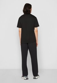 HUGO Marškinėliai su spaudiniu - black