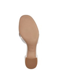 Lette beige gummisål med tekstureret greb. Hvid syntetisk overdækning med bred stropdesign. Str. 37 markeret på sålen.