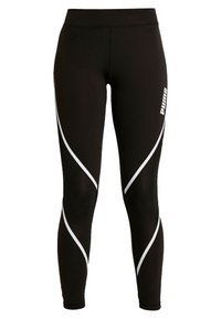 Black leggings made from stretchy fabric, featuring white curved stripes and Puma logo on the left side. Fitted design enhances mobility.