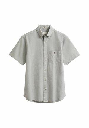 Chemise à manches courtes gris clair avec col à boutons et poche poitrine ornée d'un petit logo brodé.