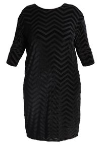 Black dress with a loose fit, 3/4 sleeves, and a chevron pattern textured in varying shades of black. Textured fabric adds depth.