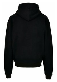 Zwarte hoodie gemaakt van zachte stof. Heeft een relaxte pasvorm, ribbelmanchetten en een ribbelzoom. Gladde textuur, geen zichtbare patronen of hardware.