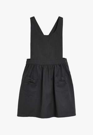 Robe tablier sans manches gris foncé avec un col carré et deux poches avant décorées de nœuds en tissu.