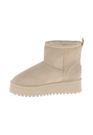 Bottes de neige - sable
