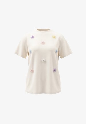 Kortærmet cremefarvet T-shirt med pastelfarvede 3D-blomsterapplikationer jævnt fordelt på fronten. Ingen andre synlige motiver eller logoer.