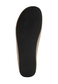 Soletta per scarpe con una superficie nera testurizzata e un bordo laterale beige, progettata per il supporto e il comfort del piede.