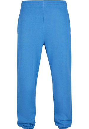 Pantaloni sportivi blu realizzati in tessuto morbido; presentano una vita e polsini elastici, con una texture liscia e una vestibilità comoda.