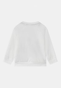 White long-sleeve sweatshirt with raglan sleeves, ribbed cuffs, and a rounded neckline. Smooth texture and minimalistic design.