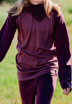 Maroon long-sleeve top with a cowl neck and extended sleeves, paired with matching leggings. Soft texture and relaxed fit.
