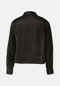 Black long-sleeve shirt with buttoned cuffs and a collar, shown from the back on a plain white background.