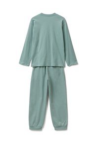 Top de algodón verde claro de manga larga con cuello redondo, combinado con pantalones de cintura elástica a juego, ambos con un corte relajado y dobladillos con puños.