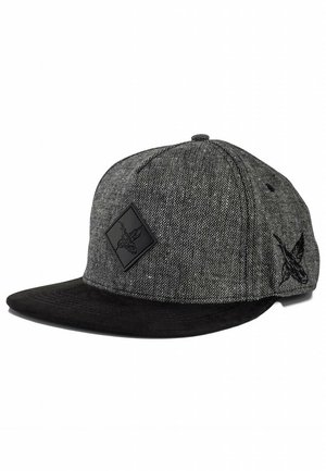 Black and gray baseball cap with a flat brim, textured fabric, and a black diamond patch featuring a bird design on the front and side.