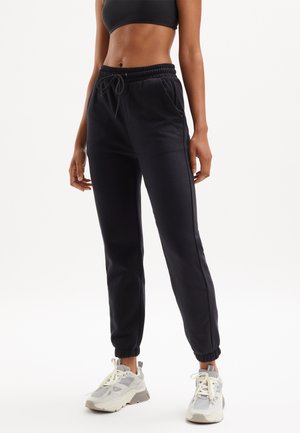 CHARLY  - Trainingsbroek - black